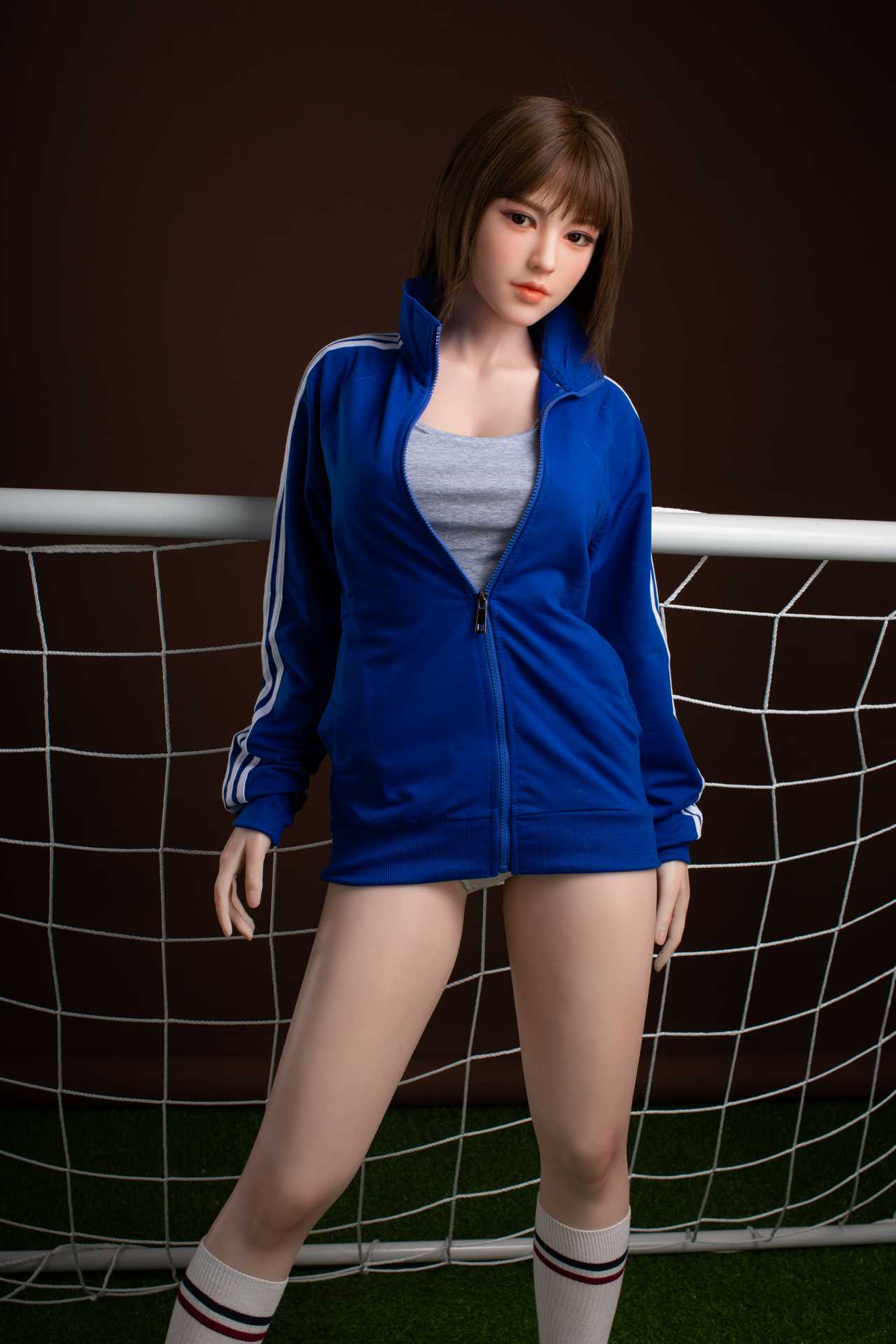 Oanez: Brunette Teen Starpery Love Doll with Football Outfit and Sultry Face Any Love Doll Starpery