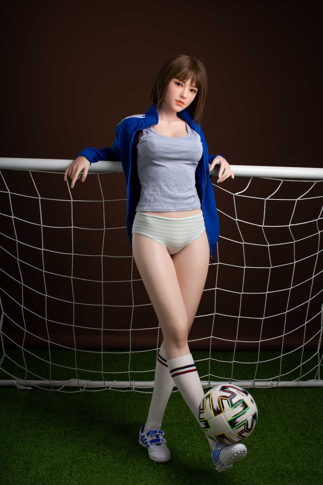 Oanez: Brunette Teen Starpery Love Doll with Football Outfit and Sultry Face Any Love Doll Starpery