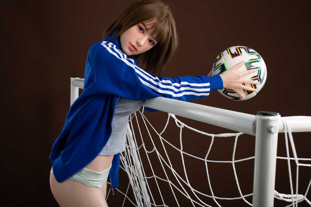 Oanez: Brunette Teen Starpery Love Doll with Football Outfit and Sultry Face Any Love Doll Starpery